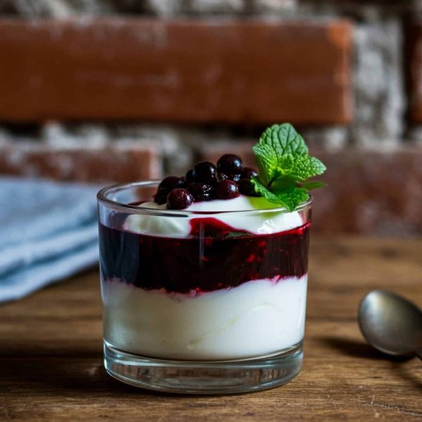 Woodberry,Compote,,Yogurt,,Seculatus,In,A,Glass,On,Wood,In